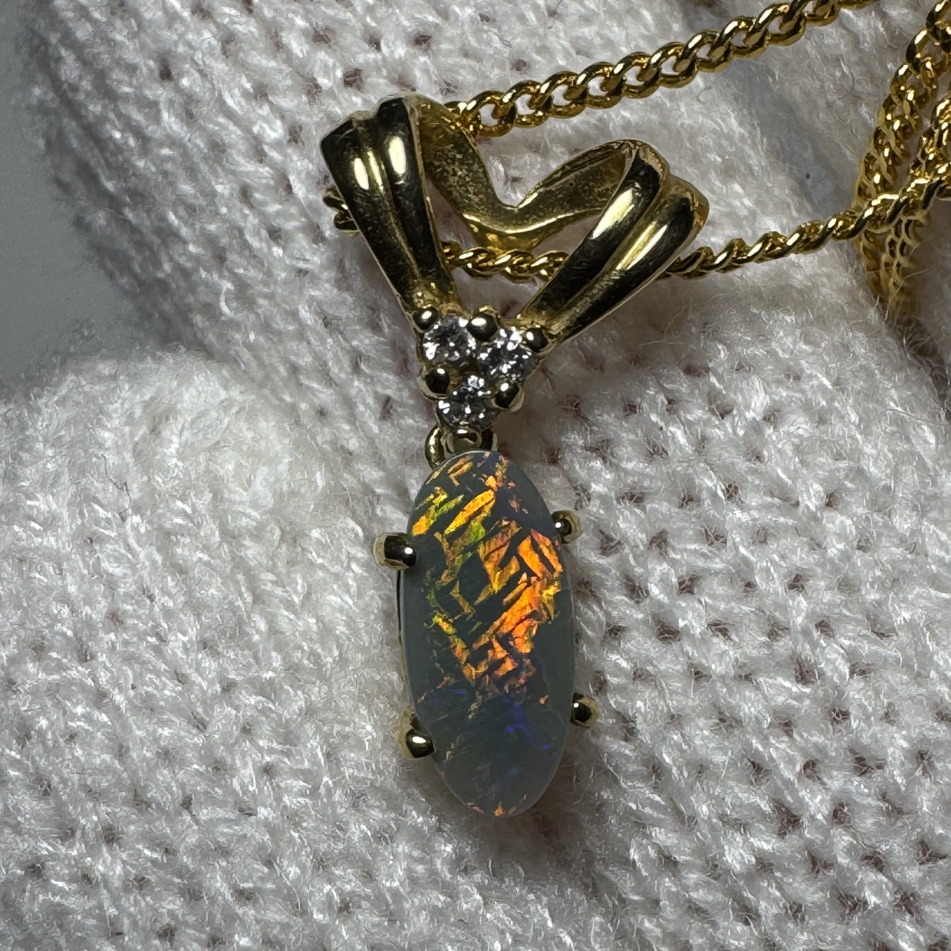 1.20 ct Solid Black Opal Pendant set in 18k Gold Pendant, Genuine Diamonds (unique pattern)